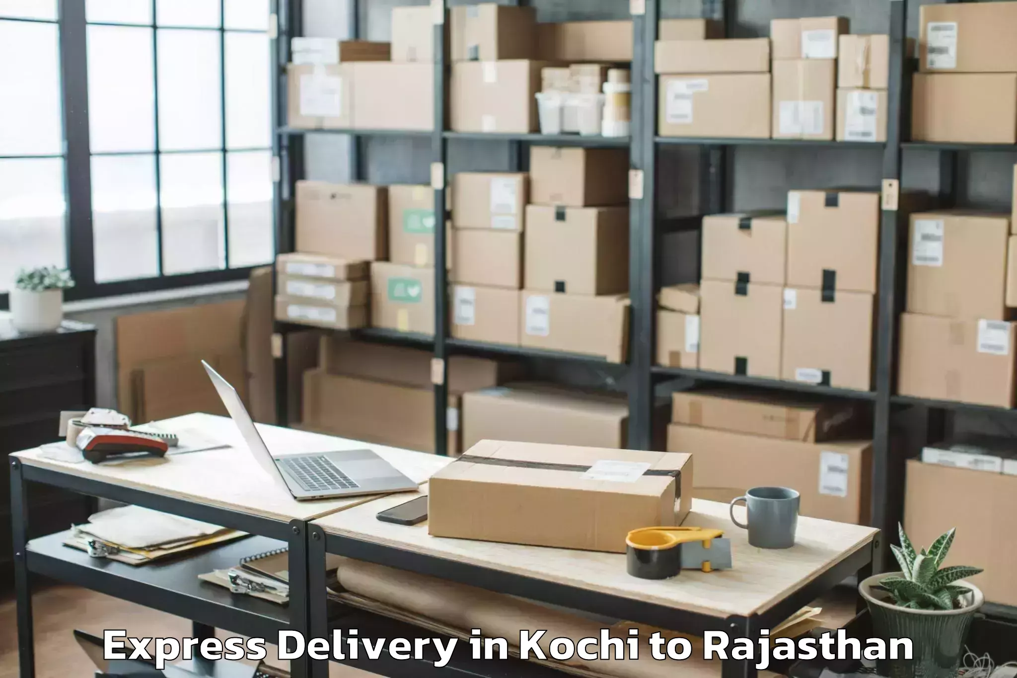 Book Kochi to Khairthal Express Delivery